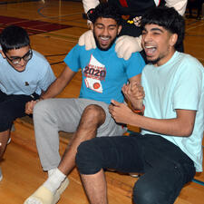 Two students laughing