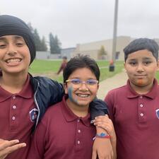 Middle year students smiling outside