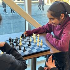 Students playing chess