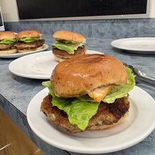 Photo of cheeseburgers prepared by students